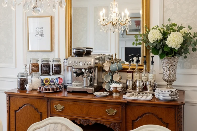 A dining room buffet converted into a coffee bar, elegant furniture, guest-serving setup, stylish entertaining station.