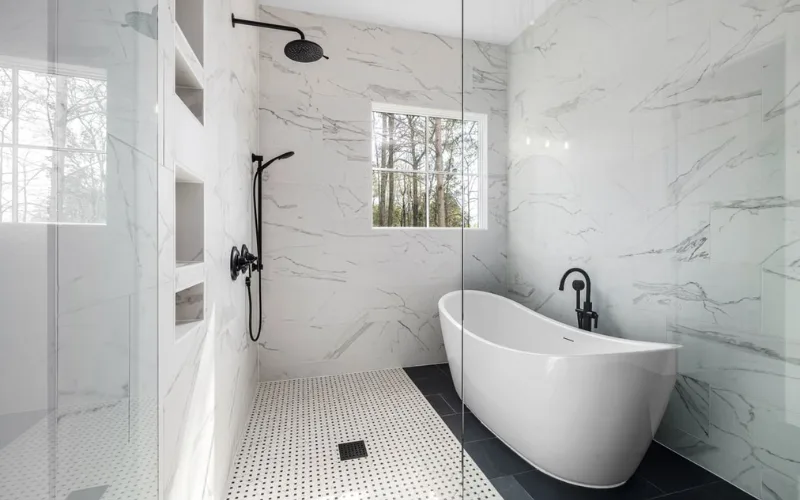 Bright modern bathroom with freestanding bathtub and walk-in shower.